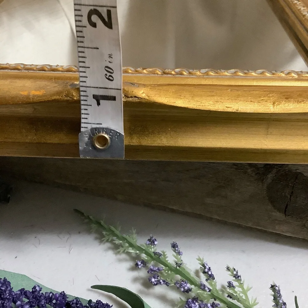Ornate Gold Wall Mirror with Decorative Frame
